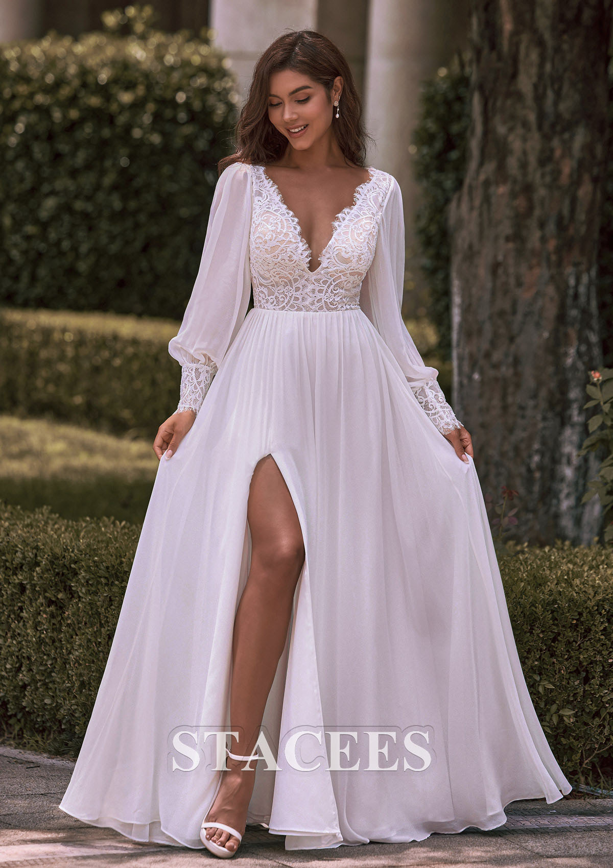 deep v long sleeve lace wedding dress Sheer-Sleeved Deep V-Neck Wedding Dress with Floral Accents and Graceful Train Custom Made