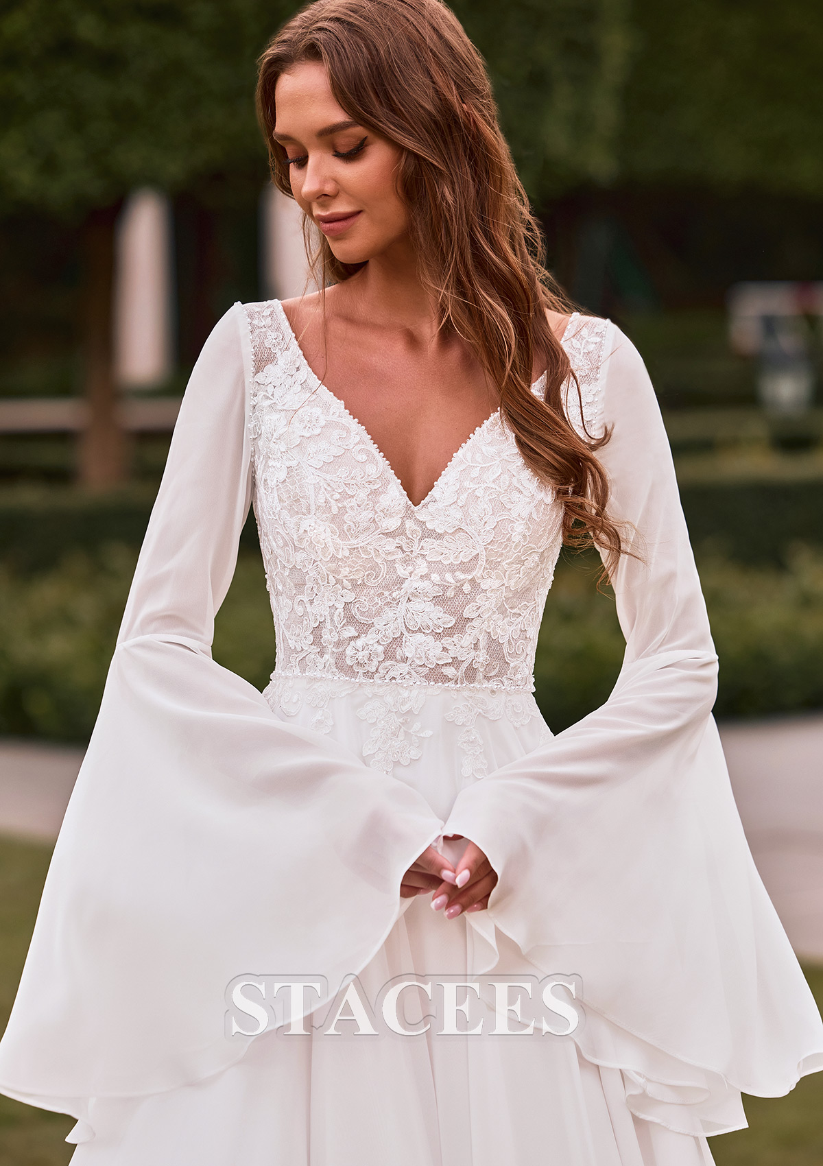 a line wedding dress with bell sleeves Stacees 2026 Boho Bridal Wedding Dress with Sheer Bell Sleeves Floral Appliques