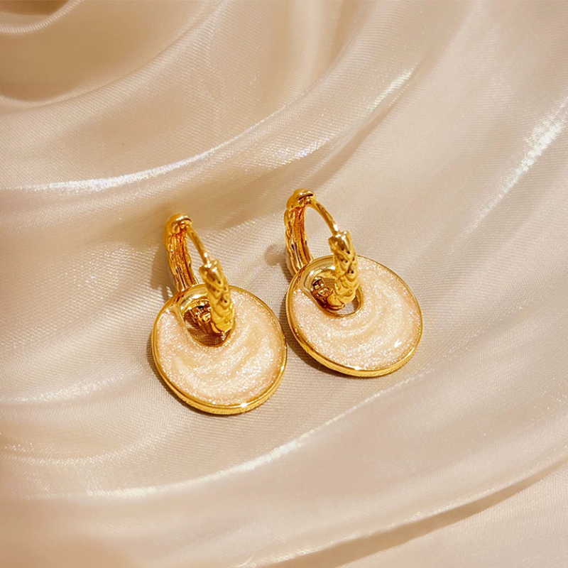Pendientes elegantes en forma de círculo de cobre para mujer